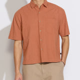 HASANI | boxy fit woven shirt | rust