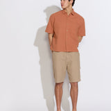 HASANI | boxy fit woven shirt | rust