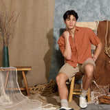 HASANI | boxy fit woven shirt | rust