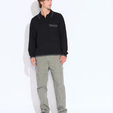 CHESHIRE | oversized fit long sleeve sweater polo | black